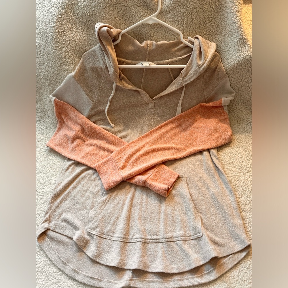 Soft lightweight hooded sweater.